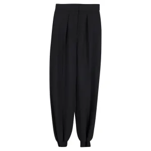 Stella McCartney Pleated Tapered Trousers in Black Wool